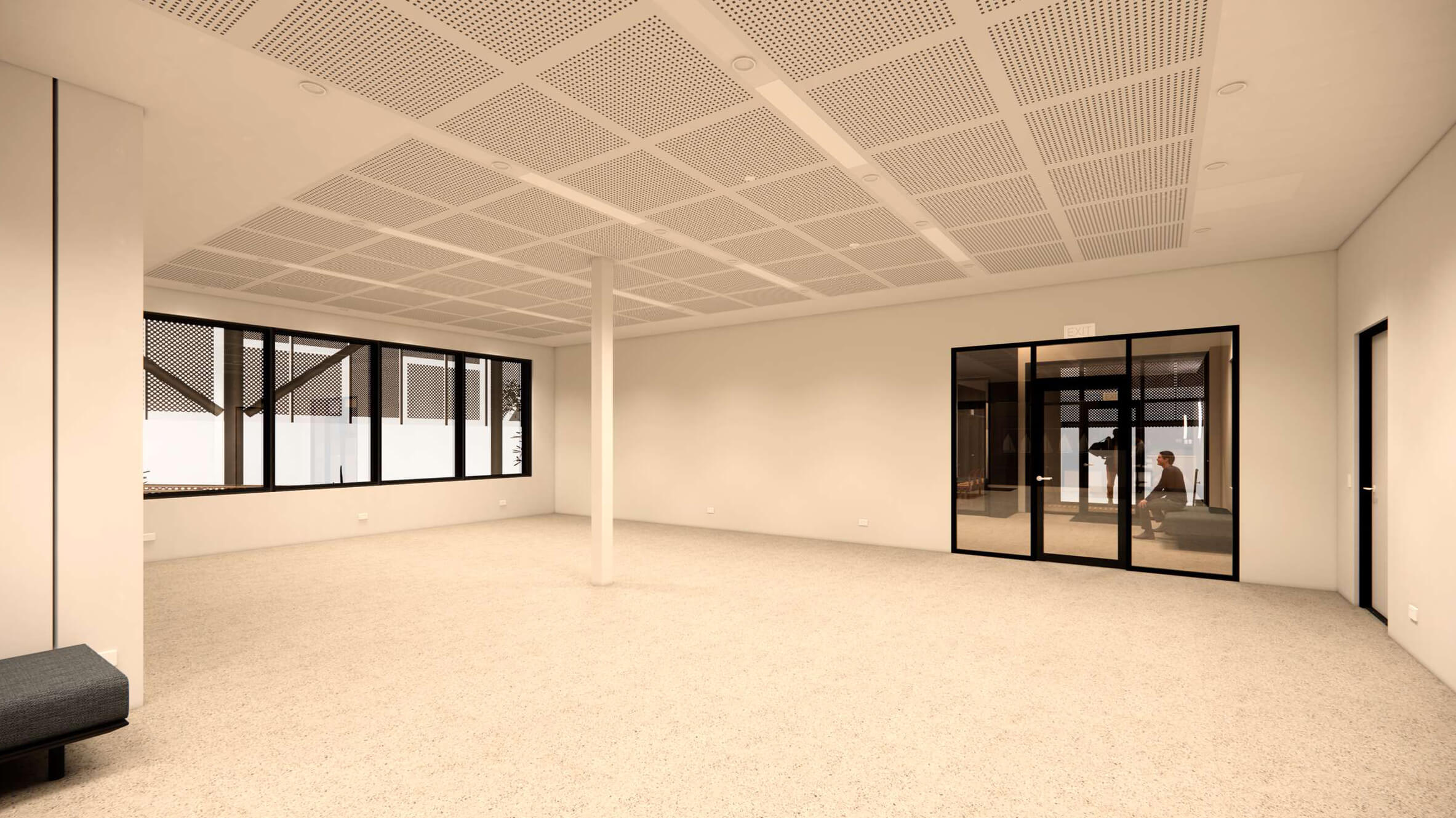 Spacious empty room with beige walls and carpet, large windows, a central support pillar, and glass double doors with a person sitting behind them.